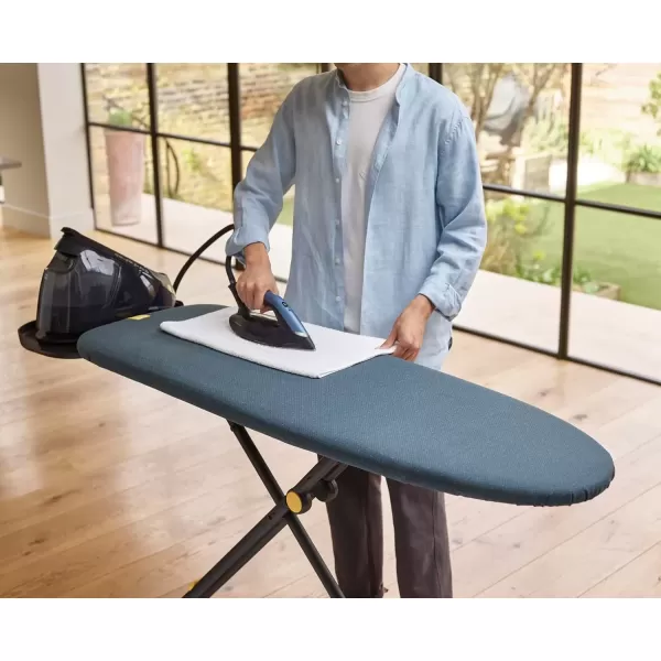imageJoseph Joseph Glide Plus Large Ironing Board 135 x 45cm with Compact Adjustable Legs and Integrated Heat Resistant Steam Iron Rest Antidrip Super Absorbent Cotton Cover BlackBlue