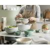 imageJoseph Joseph Nest 9 Plus 9 Piece Compact Food Preparation Set with Mixing Bowls Measuring cups Sieve and Colander Editions Range Sage GreenGreen