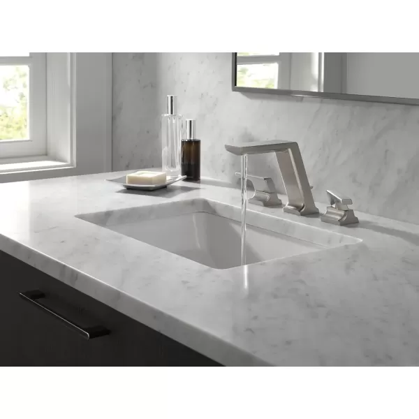 imageDelta Faucet 3599LFSSPRMPU Pivotal Widespread Stainless