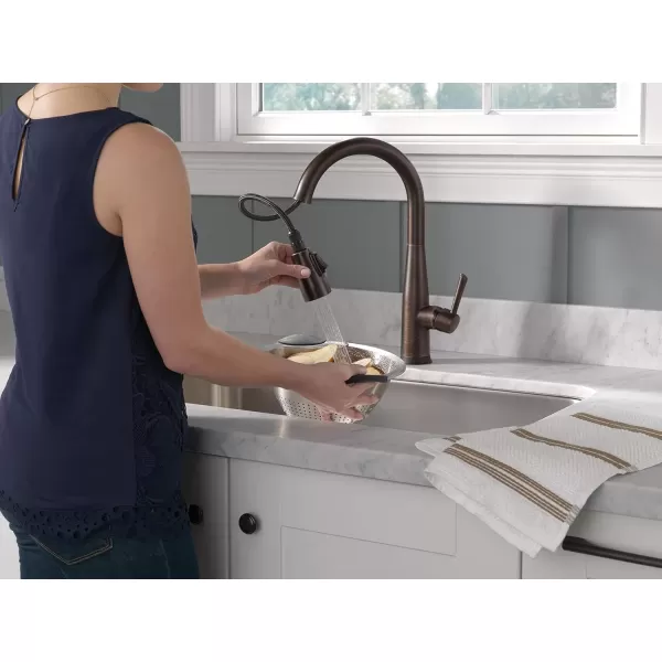 imageDelta Faucet Essa VoiceIQ Touchless Kitchen Faucet with Pull Down Sprayer Smart Faucet Alexa and Google Assistant Voice Activated Kitchen Sink Faucet Chrome 9113TVDSTVenetian Bronze