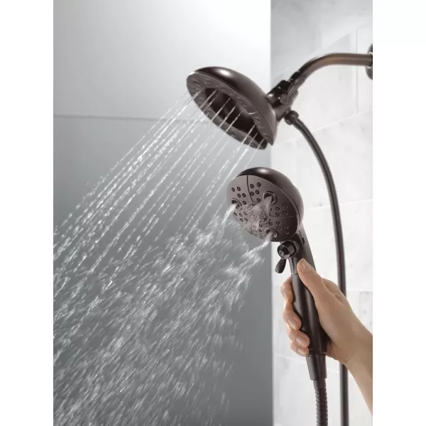 imageDelta Faucet 5Spray In2ition Dual Shower Head with Handheld Spray H2Okinetic Oil Rubbed Bronze Shower Head with Hose Handheld Shower Heads Venetian Bronze 58480RBPK 175 GPM Water FlowVenetian Bronze