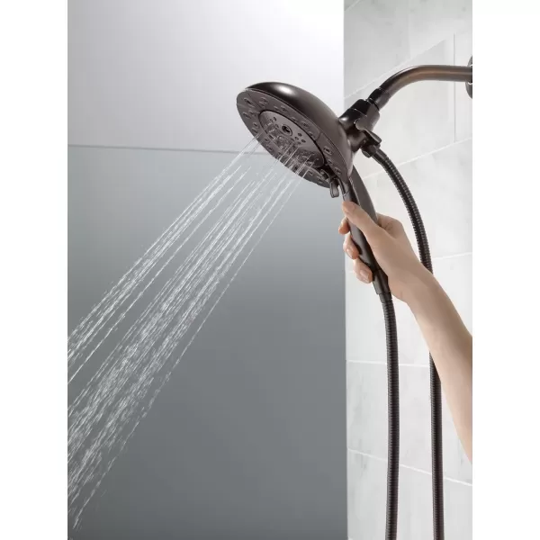 imageDelta Faucet 5Spray In2ition Dual Shower Head with Handheld Spray H2Okinetic Oil Rubbed Bronze Shower Head with Hose Handheld Shower Heads Venetian Bronze 58480RBPK 175 GPM Water FlowVenetian Bronze