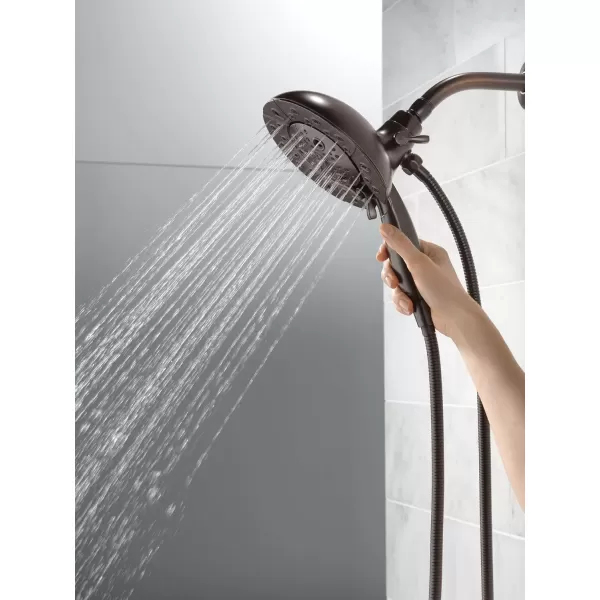 imageDelta Faucet 5Spray In2ition Dual Shower Head with Handheld Spray H2Okinetic Oil Rubbed Bronze Shower Head with Hose Handheld Shower Heads Venetian Bronze 58480RBPK 175 GPM Water FlowVenetian Bronze