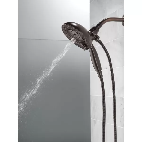 imageDelta Faucet 5Spray In2ition Dual Shower Head with Handheld Spray H2Okinetic Oil Rubbed Bronze Shower Head with Hose Handheld Shower Heads Venetian Bronze 58480RBPK 175 GPM Water FlowVenetian Bronze