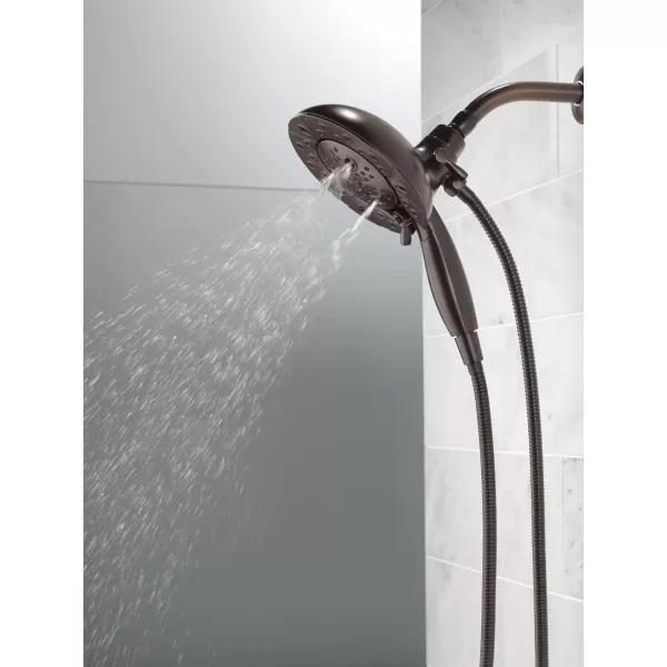 imageDelta Faucet 5Spray In2ition Dual Shower Head with Handheld Spray H2Okinetic Oil Rubbed Bronze Shower Head with Hose Handheld Shower Heads Venetian Bronze 58480RBPK 175 GPM Water FlowVenetian Bronze