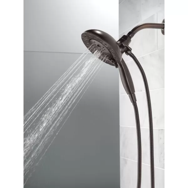imageDelta Faucet 5Spray In2ition Dual Shower Head with Handheld Spray H2Okinetic Oil Rubbed Bronze Shower Head with Hose Handheld Shower Heads Venetian Bronze 58480RBPK 175 GPM Water FlowVenetian Bronze