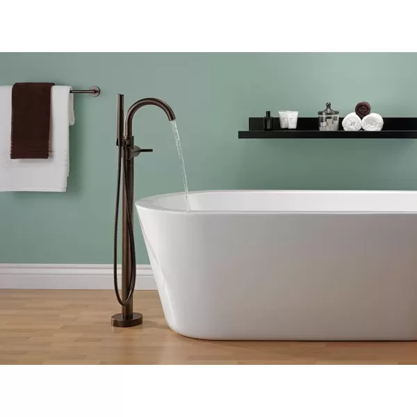 imageDelta Faucet Trinsic FloorMount Freestanding Tub Filler with Hand Held Shower Chrome Bathtub Faucet Tub Faucet Chrome T4759FL Valve Not IncludedVenetian Bronze