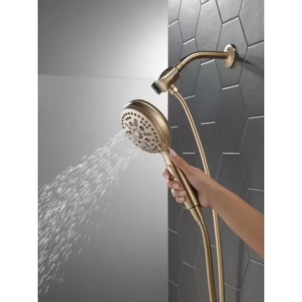 imageDelta Faucet 54810PK SureDock Chrome Hand Shower with MagnaTite Technology 7 Spray SettingsChampagne Bronze