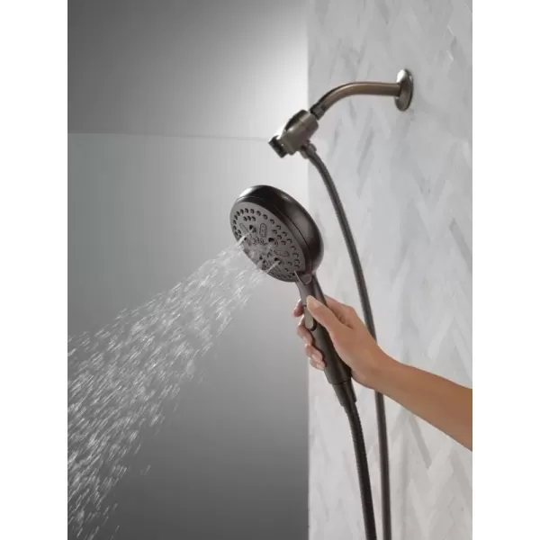 imageDelta Faucet 54810PK SureDock Chrome Hand Shower with MagnaTite Technology 7 Spray SettingsVenetian Bronze