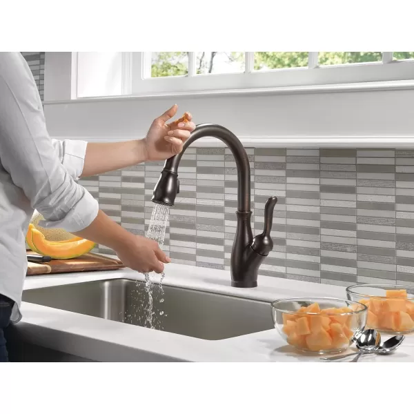 imageDELTA 9178TLDST Leland Kitchen Faucet Touch  Touchless ChromeVenetian Bronze