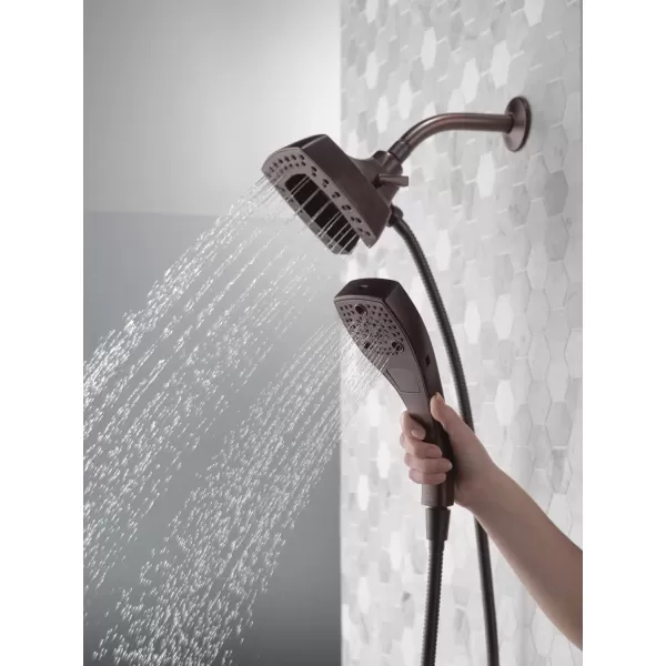 imageDelta Faucet 5Setting In2ition 2in1 Dual Hand Held Shower Head with Hose Oil Rubbed Bronze Shower Head Handheld Combo Magnetic Docking Handheld Shower Head 25 GPM Venetian Bronze 58474RB25Venetian Bronze
