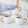 imageStone lain Florian Contemporary Porcelain Bowl Set Modern Gold and WhiteJosephine  Blue