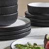 imageChristian Siriano Laro 12Piece Stoneware Dinnerware Set Plates and Bowls Set Microwave and Dishwasher Safe Dish Set for 4 GreenBlack