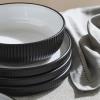 imageChristian Siriano Laro 12Piece Stoneware Dinnerware Set Plates and Bowls Set Microwave and Dishwasher Safe Dish Set for 4 GreenBlack
