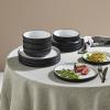imageChristian Siriano Laro 12Piece Stoneware Dinnerware Set Plates and Bowls Set Microwave and Dishwasher Safe Dish Set for 4 GreenBlack