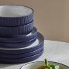 imageChristian Siriano Laro 12Piece Stoneware Dinnerware Set Plates and Bowls Set Microwave and Dishwasher Safe Dish Set for 4 GreenDark Blue