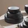 imageChristian Siriano Larosso 12Piece Stoneware Dinnerware Set with Dinner Bowls and Pasta Bowls Plates and Bowls Set Dish Set for 4 Dark BlueBlackWhite
