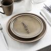 imageStone Lain Vince Stoneware Reactive Glaze Dinnerware Set 16 Piece Service for 4 GrayTina Green and Beige
