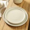 imageStone Lain Eden 24Piece Dinnerware Set Stoneware Plates and Bowls Set Dishwasher and Microwave Safe Dish Dish Set for 8 Dark BlueBeige