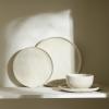 imageStone Lain Mirella 12Piece Dinnerware Set Stoneware Plates and Bowls set Microwave and Dishwasher Safe Dish Set for 4 BlueBeige