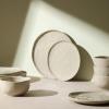 imageStone Lain Mirella 12Piece Dinnerware Set Stoneware Plates and Bowls set Microwave and Dishwasher Safe Dish Set for 4 BlueBeige