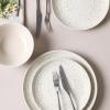 imageStone Lain Dua 12Piece Dinnerware Set Stoneware Plate and Bowls Set Dishwasher and Microwave Safe Dish Set for 4 BlackWhite