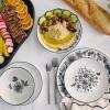 imageStone Lain Esme 12Piece Dinnerware Set Porcelain Plates and Bowls Set Dish Set for 4 Microwave and Dishwasher Safe GreenBlack