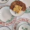 imageStone Lain Esme 12Piece Dinnerware Set Porcelain Plates and Bowls Set Dish Set for 4 Microwave and Dishwasher Safe GreenRed