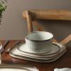 imageStone Lain Cairo 12Piece Dinnerware Set Stoneware Plates and Bowls Set Microwave and Dishwasher Safe Includes Dinner and Salad Plates Cereal Bowls Dishes for 4 SandGray