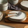 imageStone Lain Cairo 12Piece Dinnerware Set Stoneware Plates and Bowls Set Microwave and Dishwasher Safe Includes Dinner and Salad Plates Cereal Bowls Dishes for 4 SandGray