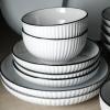 imageChristian Siriano Lustra Modern 16Piece Stoneware Dinnerware Set Plates and Bowls Set Dinner and Salad Plates Ramen Bowls Dishes for 4 BlackWhite