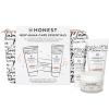 imageThe Honest Company New Mama Care Essentials Gift Set  Hospital Bag Must Haves  Travel Size Nip Balm 05 oz Glow On Body Cream 1 oz Gotta Glow Face Wash 175 fl oz Reusable PouchNew Mama Mini Essentials Set
