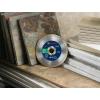 imageBOSCH DB443C 4 in Premium Continuous Rim Diamond Blade with 58 in 78 in Arbor for Clean Cut WetDry Cutting Applications in Tile Granite MarbleWet