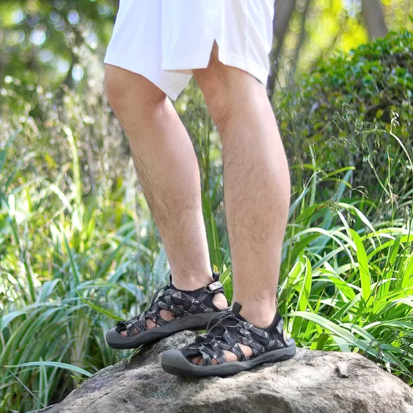imageGRITION Mens Outdoor Hiking Sandals Protective Topcap Water Shoes Athlatic Sport Walking Sandals Waterproof Quick Dry for Fisherman BeachBlack Grey