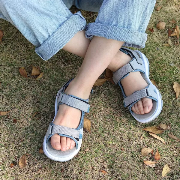 imageGRITION Womens Summer Trekking Sandals Adjustable Flat Hiking Sandals Comfortable Outdoor Open Toe Lightweight Flower Pattern Beach Shoes for Water SportsBlue