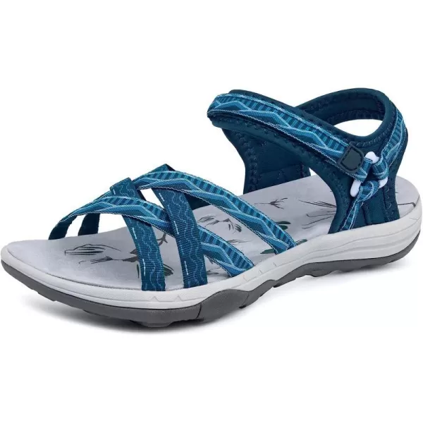 imageGRITION Women Hiking Sandals Wide Outdoor Girl Sport Summer Flat Beach Water Shoes Open Toe Adjustable Walking ShoesDark Blue