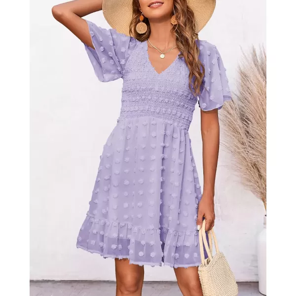 imageBTFBM Womens V Neck Smocked Short Sleeve Casual Dress Swiss Dot Swing Flowy Ruffle Hem Mini Beach Summer Dresses 2023Swiss Dot Light Purple